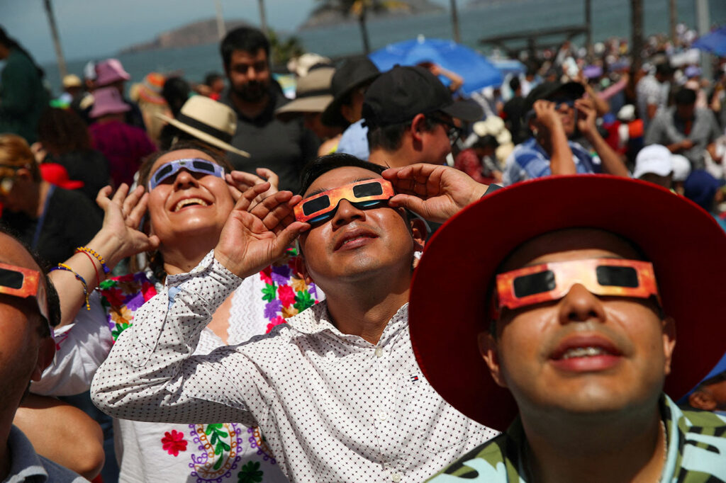 Millions of people spanning Mexico, the US, and Canada cast their gaze skyward on Monday to witness the awe-inspiring spectacle of a total solar eclipse tracing a slender path of darkness across the continent.