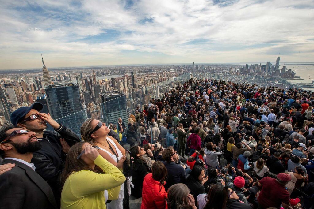 Millions of people spanning Mexico, the US, and Canada cast their gaze skyward on Monday to witness the awe-inspiring spectacle of a total solar eclipse tracing a slender path of darkness across the continent.