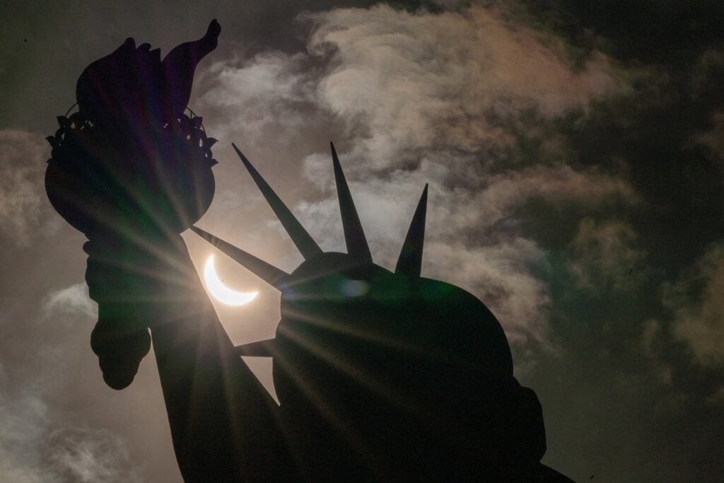 Millions of people spanning Mexico, the US, and Canada cast their gaze skyward on Monday to witness the awe-inspiring spectacle of a total solar eclipse tracing a slender path of darkness across the continent.