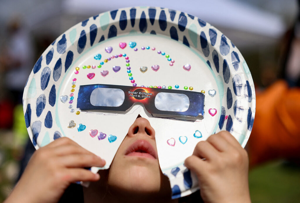 Millions of people spanning Mexico, the US, and Canada cast their gaze skyward on Monday to witness the awe-inspiring spectacle of a total solar eclipse tracing a slender path of darkness across the continent.