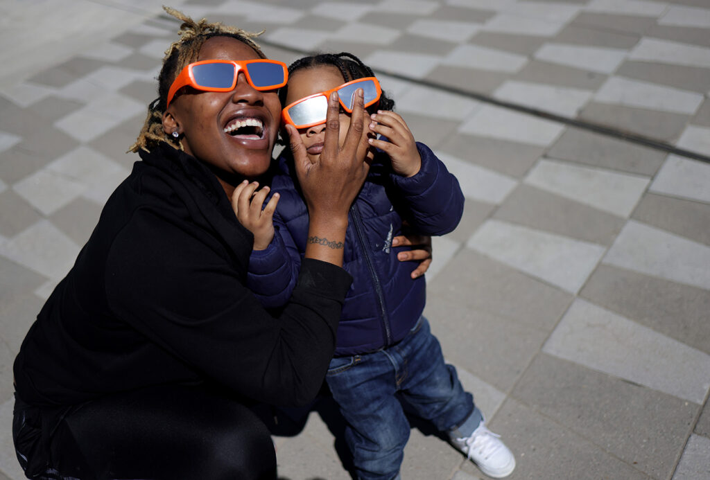 Millions of people spanning Mexico, the US, and Canada cast their gaze skyward on Monday to witness the awe-inspiring spectacle of a total solar eclipse tracing a slender path of darkness across the continent.