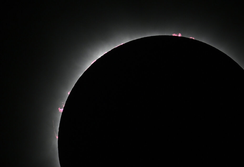 Millions of people spanning Mexico, the US, and Canada cast their gaze skyward on Monday to witness the awe-inspiring spectacle of a total solar eclipse tracing a slender path of darkness across the continent.